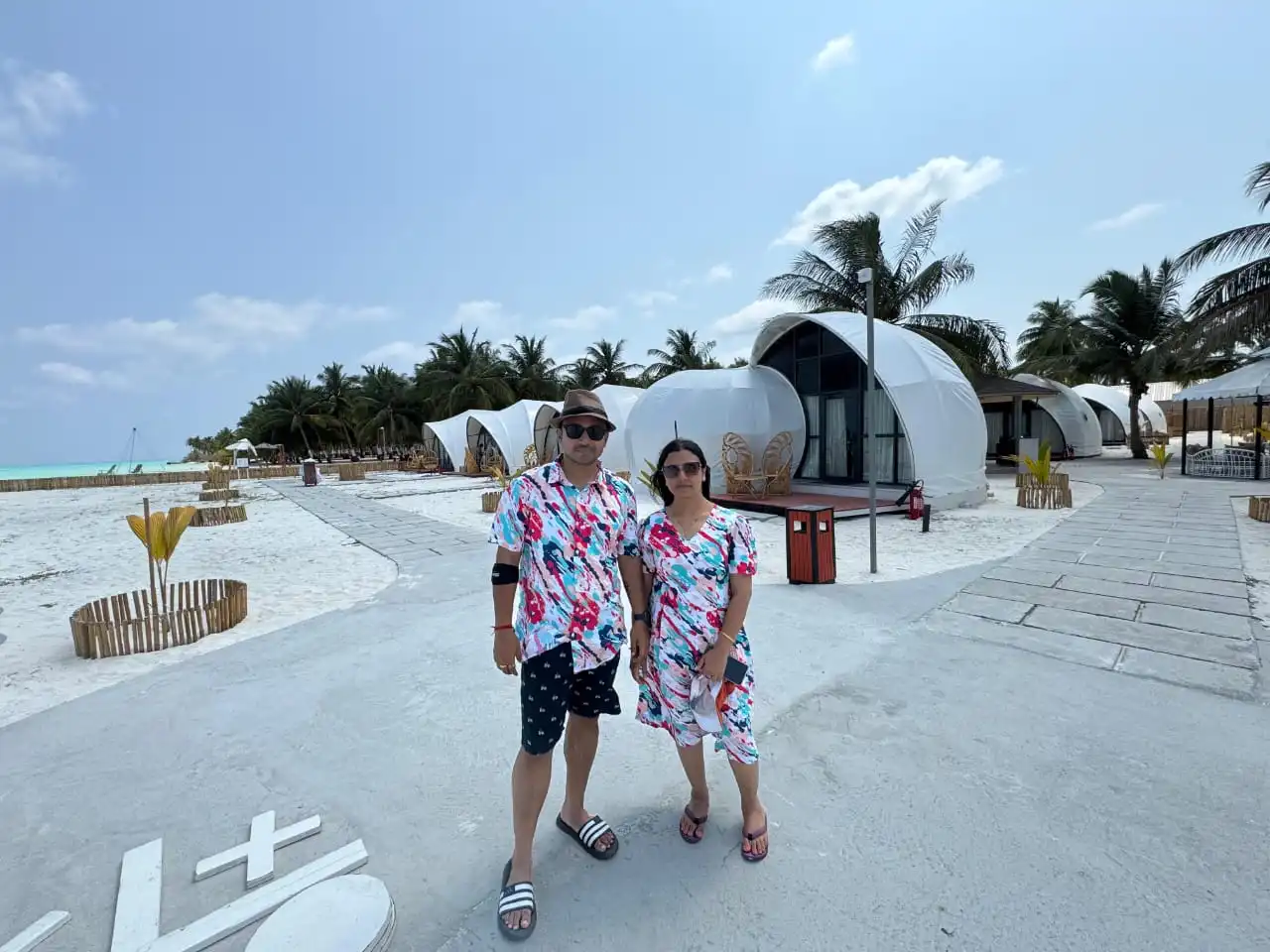 happy guest at Coral Pearl Bangaram with Touristhub Holidays